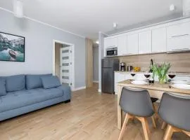 Stylish Apartment Rybacka with Parking by Noclegi Renters