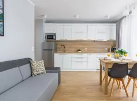 Seaside Apartment Rybacka with Parking by Noclegi Renters
