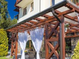 Willa Trela, hotel with hot tubs in Muszyna