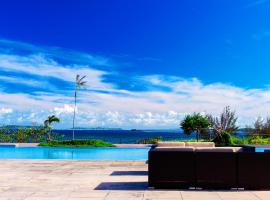 LiVEMAX Amms Canna Resort Villa, rumah kotej di Ginoza