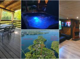 RESET W WERLASIE- Domek - Jacuzzi -kajak - ApartamentyHappy pl, hotel en Werlas