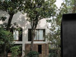 Rakuhotel, hotel en Wenzhou