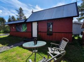 Camp Caroli Wooden Cabins, хотел в Юкасярви