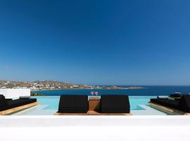 Magnificent Mykonos Villa Villa Rikei 5 Bedrooms Unique Aegean Sea Views, hotel din Psarou