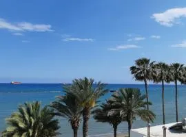 Beachfront Bliss 3BR Apt with Panoramic Sea View
