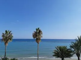Beachfront Bliss 3BR Apt with Panoramic Sea View