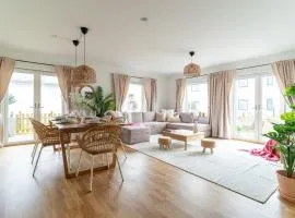 Bright Ground Floor Corner Home with Cozy Outdoor