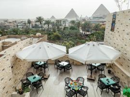 Night Pyramids Inn Hotel, hotel de playa en El Cairo