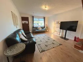 Cozy 2 bedrooms with private parking space and garden