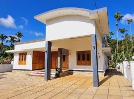 Wayanadan Mountain View service villa, hotel v destinaci Koroth