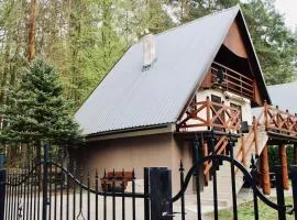 Bajkowe Chatki domki letniskowe nad jeziorem Narie