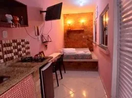 Mini casa pé na areia