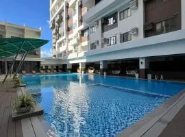 Cozy Stay Luxury Apartments in Be Residences walk to IT Park with netflix fast wifi pool access