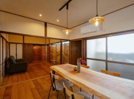 民泊貸別荘 フェザンツ2, hotel con pileta en Matsuyama