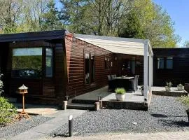 Rustiek bos chalet Sven