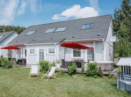Ferienhäuser Insel Usedom Haus Jojo 7 - Blick aufs Achterwasser! Whirlpool und Sauna, hôtel à Lütow
