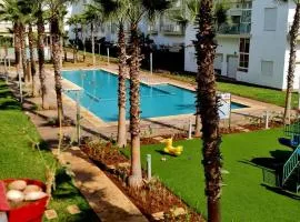 Appartement bouznika kettani avec jardin privé accés direct à la piscine