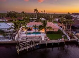 Whispering Palms! Private canal side dock and pool with spa!