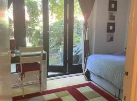 Charming Bedroom with Garden