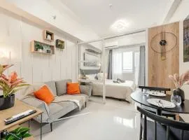 Modern Minimalist Studio with Balcony & Sunset View