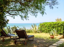 Salty Noses Beach House Paradise Perfect for Families, hotel v destinaci Pyrgos