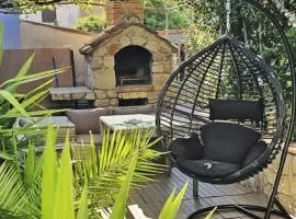 Holiday Place Veli Dvor - vacation house with private garden in old town Punat