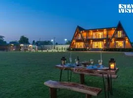 StayVista at Aarna Estate with library, lawn