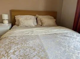 Master Bedroom Kingsize Bed work desk and wardrobe
