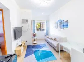 Tropical 2BR with Pool & Walk to Beach entry to white sand