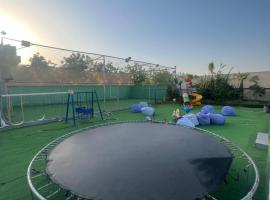 1001 nights , Wild farm Football, Jacuzzi, BBQ Sharjah, hotel in Ḩaşat al Bidīyah