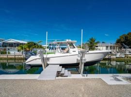 Coastal Paradise 5 bedroom retreat with pool spa and a boat lift