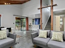 Central and Cozy 2BR Retreat With Parking and Free Wifi