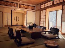 五斗觀驛站 gotokan guest house, hotel para golfe em Suita