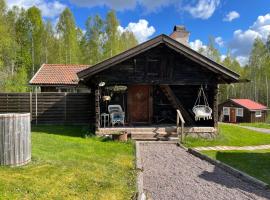 Luftens timmerstuga, hytte i Sunne