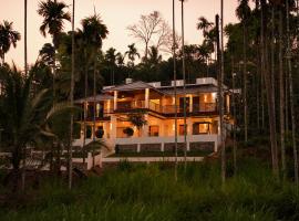 The Calm County Homestay, hotel v destinaci Mānantoddy
