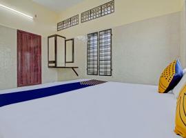 SPOT ON J P Tourist Home, hotel v destinaci Kollam