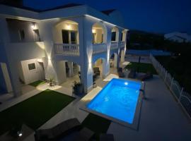 Apartments with swimming pool Pag - 24360, hotel in Pag