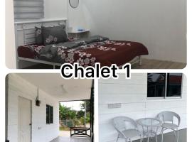 Chalet Al-Fateh Lubok China, בקתה בLubuk Cina