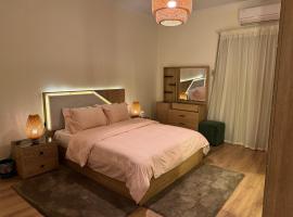 1 BR cozy apartment in Zamalek, hotel in Banī Ghālib