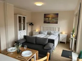 Ferienwohnung Ritthoff Perlebucht - mit Strandkorb am Meer und kostenloser Eintritt ins Schwimmbad