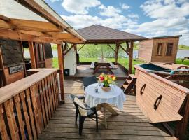 Kempings Daugmales, sz&aacute;ll&aacute;s Landzāni v&aacute;ros&aacute;ban