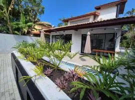 50m praia Cond pé na areia Alto padrao 4 suites Segur 24h Costa do sol Guaratuba Bertioga prox Riviera
