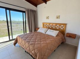 Cabaña YMBYATY, hotel v destinaci Colonia Carlos Pellegrini