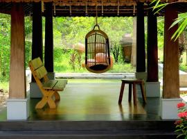 Clayfingers Art Cottage, hotel in Thrissur