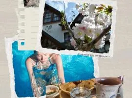 Goldener Hahn B&B Baiersbronn - Ferienwohnungen mit Hygge Pool & Sauna