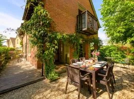 Cosy Cotswold Lodge by Your Home Here - ideal for families, log-burner, spa, private parking, EV Hookup included and heated swimming pools