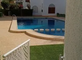 Studio with pool and sunrise view at 10 min beach walk