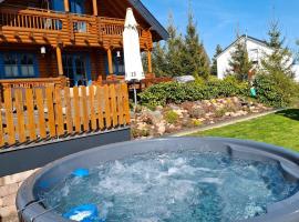 Holzhaus Mühlenblick mit Whirlpool, hotel en Medebach