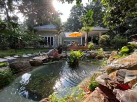 Villa Tsukino Usagi, hotel amb banyeres d'hidromassatge a Ko Phangan