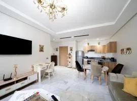 Studio Confortable avec Balcon, Piscine, Jardin et Aire de Jeux